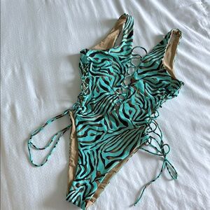 Luli Fama swimsuit